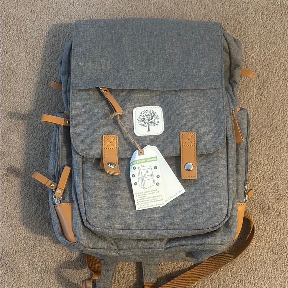 Gray and Tan Canvas Backpack with Leather Straps